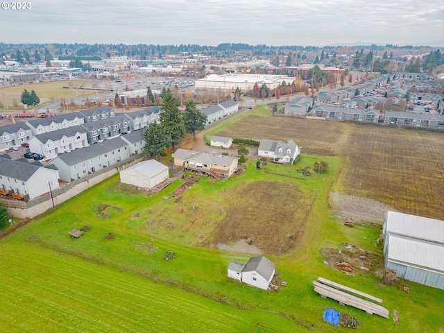 birds eye view of property featuring a rural view