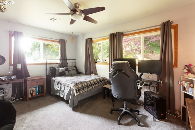 33423 Timber Ln, Eugene, OR 97405 - carpeted bedroom with multiple windows, an office area, and a ceiling fan