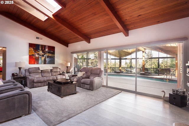 33423 Timber Ln, Eugene, OR 97405 - living area with a wooden ceiling with exposed beams, a skylight, and high vaulted ceiling