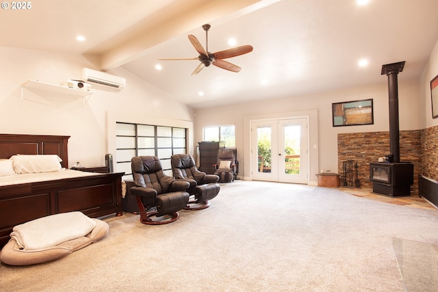 33423 Timber Ln, Eugene, OR 97405 - bedroom featuring access to outside, a wall mounted AC, carpet, a wood stove, and recessed lighting