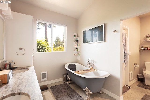 33423 Timber Ln, Eugene, OR 97405 - full bathroom featuring a freestanding tub, double vanity, vaulted ceiling, and heating unit