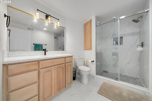 full bathroom featuring visible vents, toilet, marble finish floor, a marble finish shower, and vanity