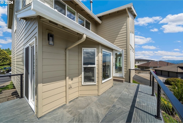 view of home's exterior with a balcony