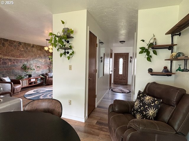 1676 NW Apache Dr, Roseburg, OR 97471 - living area featuring wood finished floors