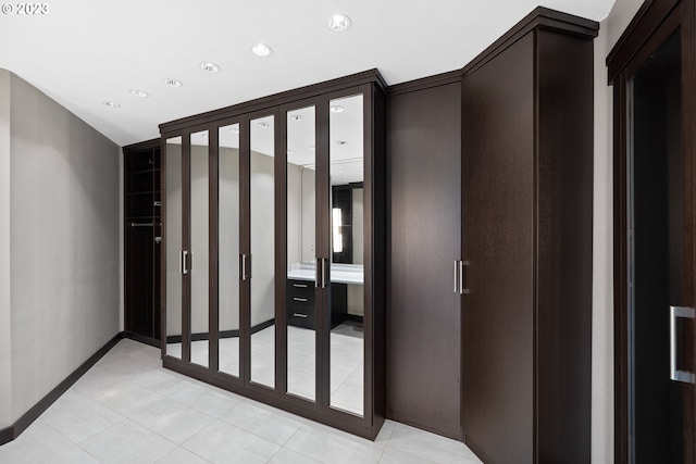 interior space featuring light tile patterned flooring