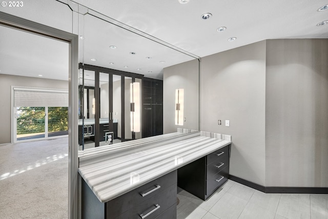 bathroom featuring vanity and recessed lighting