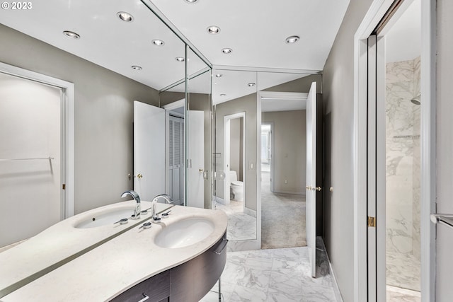 full bath with toilet, marble finish floor, recessed lighting, baseboards, and vanity