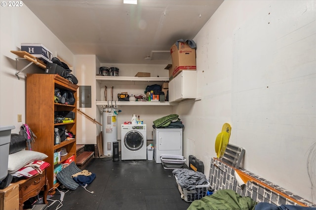 washroom featuring cabinets, electric panel, electric water heater, and washer and dryer