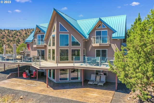 back of house with a patio area