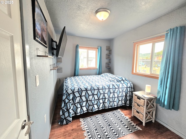 2951 NE Yount Ave, Roseburg, OR 97470 - bedroom featuring wood finished floors and a textured ceiling