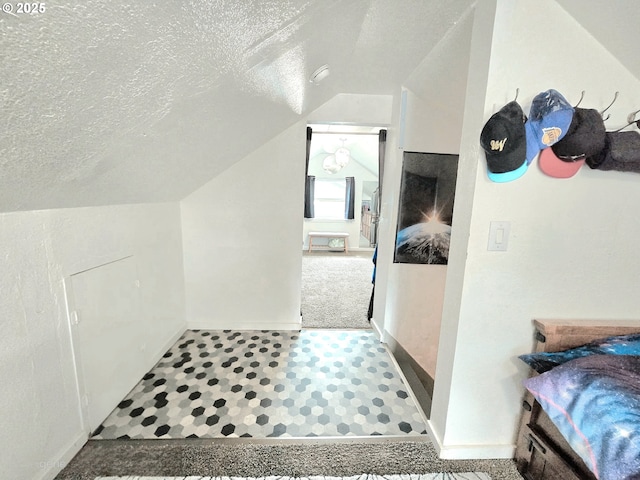 2951 NE Yount Ave, Roseburg, OR 97470 - bonus room featuring lofted ceiling, a textured ceiling, and baseboards