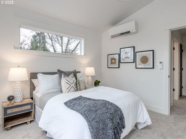 bedroom featuring light carpet, baseboards, a wall unit AC, and vaulted ceiling