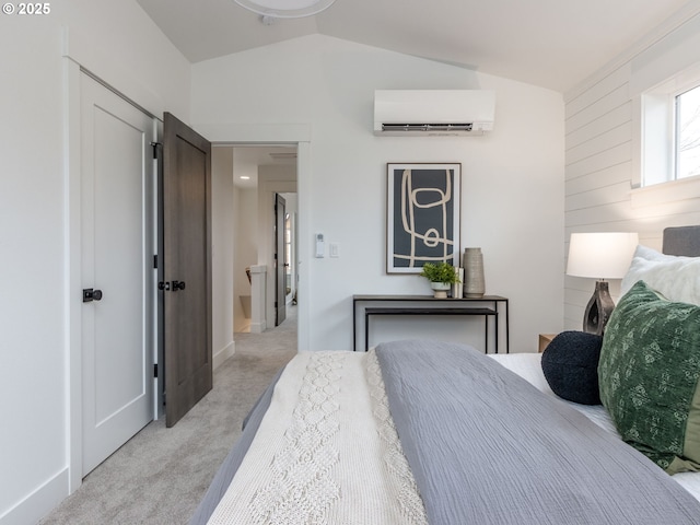 bedroom featuring light colored carpet, a wall mounted AC, and lofted ceiling