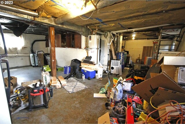 basement with strapped water heater