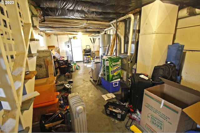 basement featuring white refrigerator