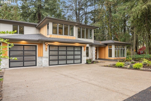 prairie-style house featuring a garage