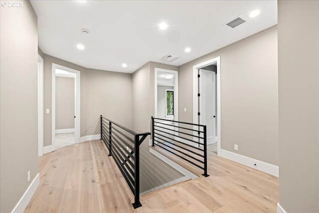 hallway with light wood-type flooring