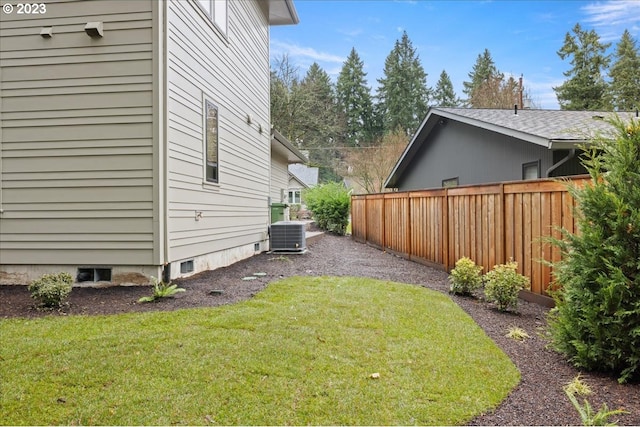 view of yard featuring central AC