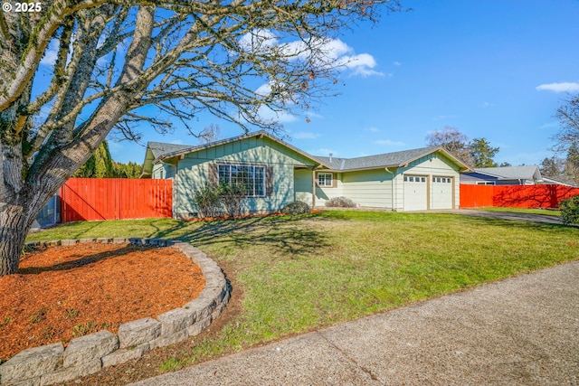 single story home with a garage, driveway, a front yard, and fence