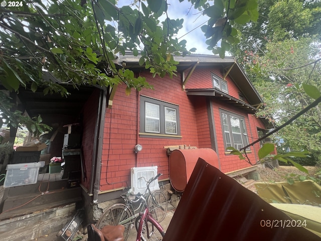 view of home's exterior featuring heating fuel