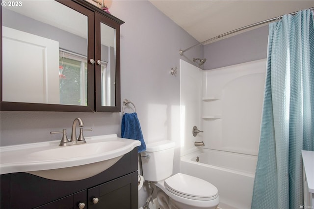 full bathroom with toilet, vanity, and shower / bathtub combination with curtain