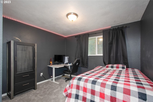 carpeted bedroom with a textured ceiling