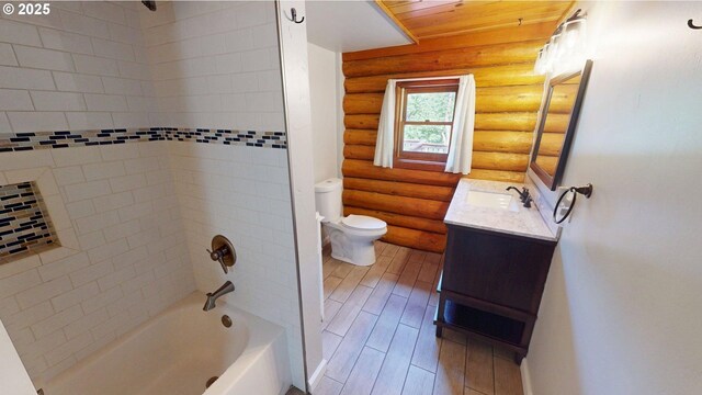 17285 Rustic Ln, Brookings, OR 97415 - full bathroom with rustic walls, shower / bath combination, toilet, and vanity