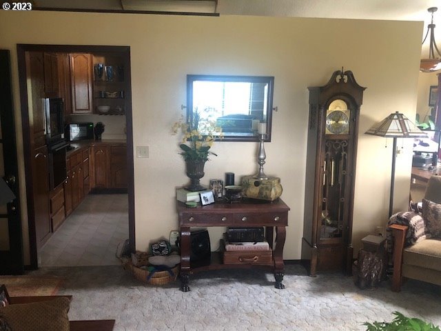 living room with light colored carpet