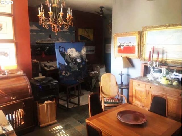 dining space featuring a chandelier