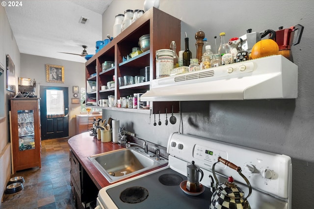 kitchen featuring ventilation hood, white range, sink, ceiling fan, and a textured ceiling