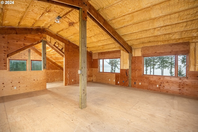 additional living space with lofted ceiling