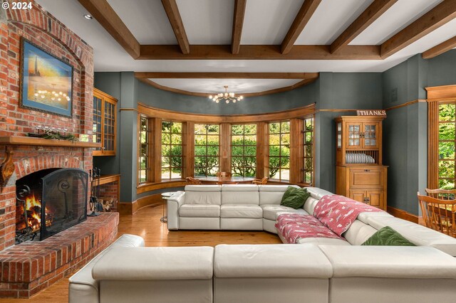 entrance foyer featuring wood-type flooring and a premium fireplace