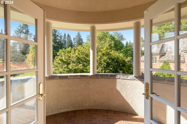 unfurnished sunroom featuring a healthy amount of sunlight