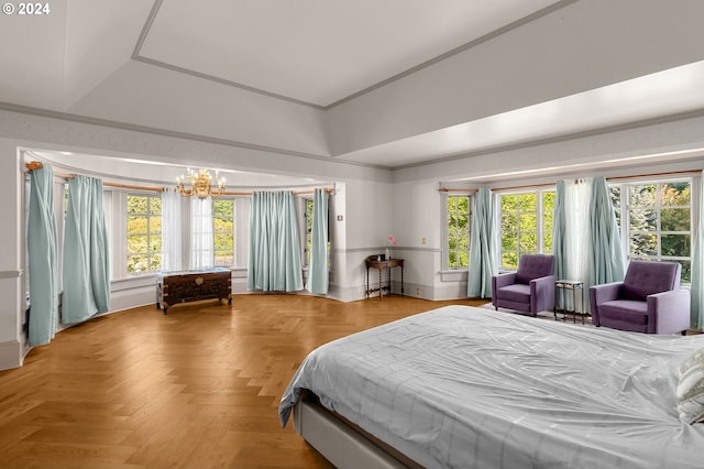 bedroom with a chandelier, baseboards, and ornamental molding