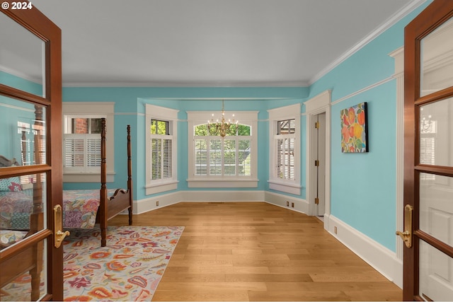 unfurnished sunroom with a chandelier