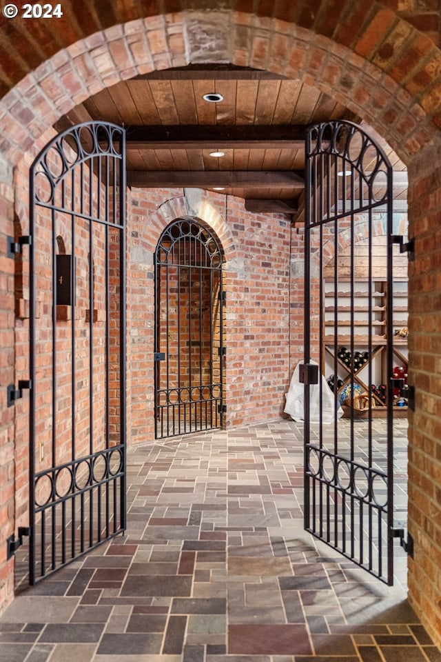 wine area with brick floor and brick wall