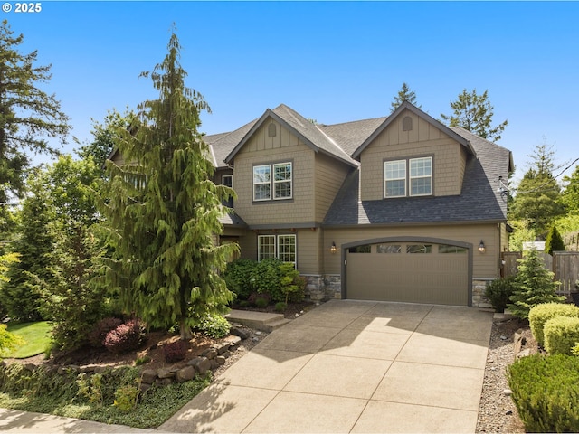 4425 SW 47th Dr, Portland, OR 97221 - craftsman-style home with stone siding, driveway, and roof with shingles