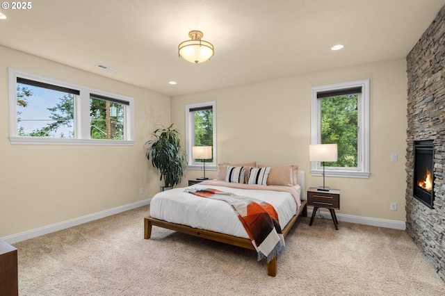 4425 SW 47th Dr, Portland, OR 97221 - bedroom featuring carpet flooring, a fireplace, baseboards, and recessed lighting