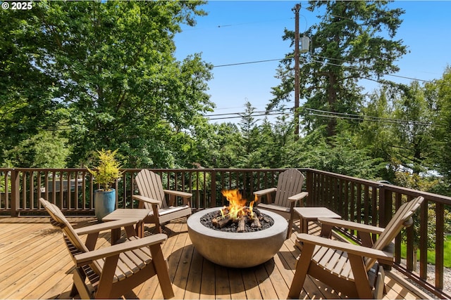 4425 SW 47th Dr, Portland, OR 97221 - wooden deck with a fire pit