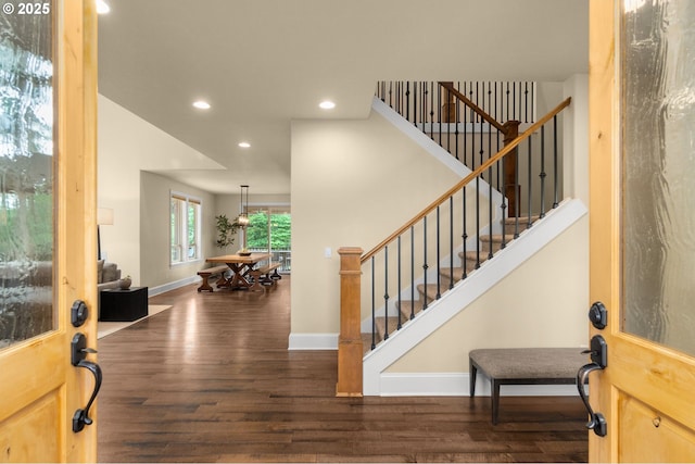 4425 SW 47th Dr, Portland, OR 97221 - foyer featuring wood finished floors, recessed lighting, stairway, and baseboards