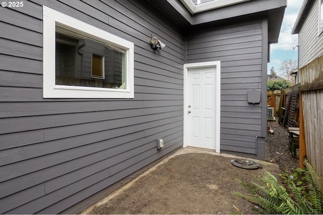 property entrance featuring fence