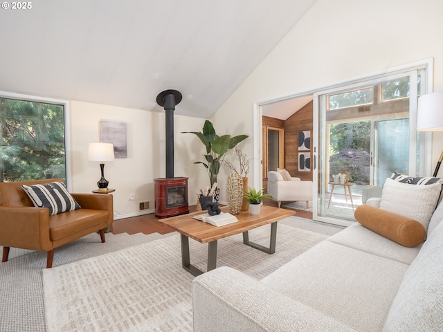 11135 SW Novare Pl, Tigard, OR 97223 - living room with a wood stove and lofted ceiling