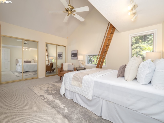 11135 SW Novare Pl, Tigard, OR 97223 - carpeted bedroom with two closets, high vaulted ceiling, and a ceiling fan