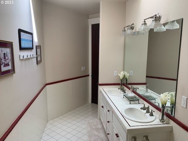 bathroom featuring vanity and tile patterned flooring