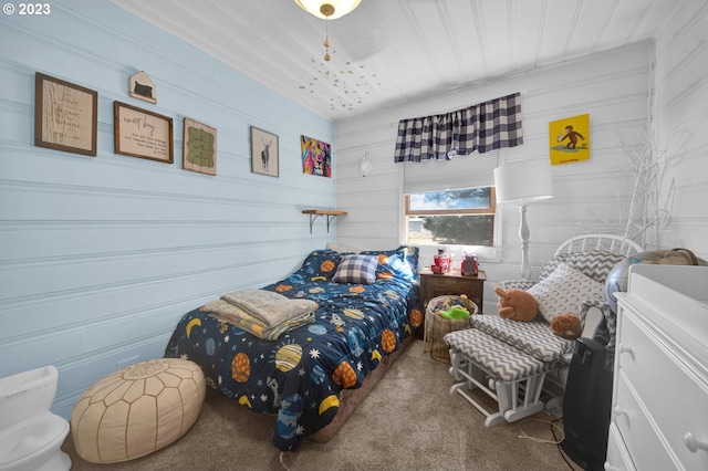 bedroom with dark carpet