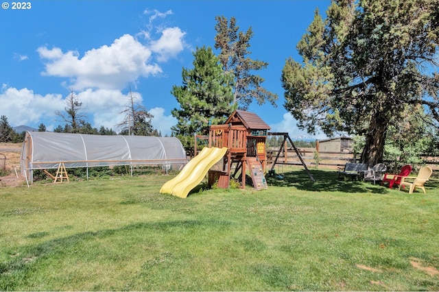 view of play area featuring a yard