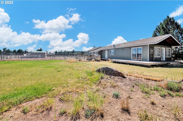 view of yard with a deck