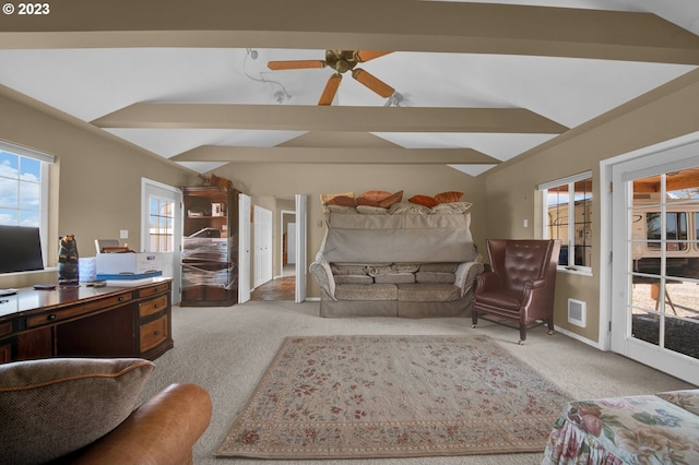 carpeted living room with ceiling fan and vaulted ceiling with beams