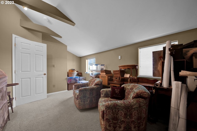 carpeted living room with vaulted ceiling