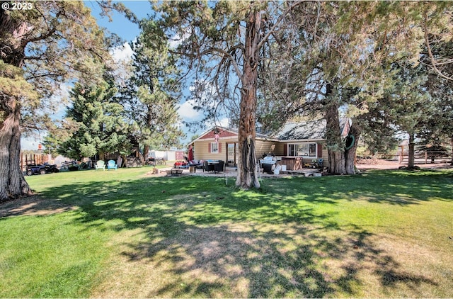 view of yard with a wooden deck